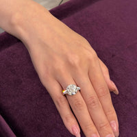 Round Diamond Ring (with Tapered Baguette)